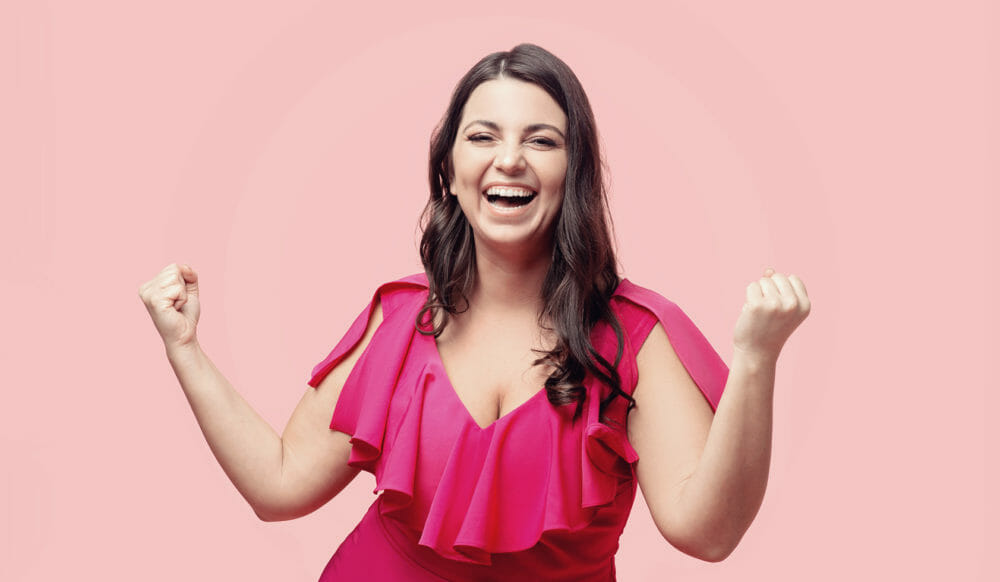 A woman in a hot pink dress