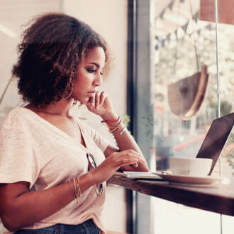 A woman looking at Lily AI's Search Analytics Dashboard that helps to elevate your zero-party data.